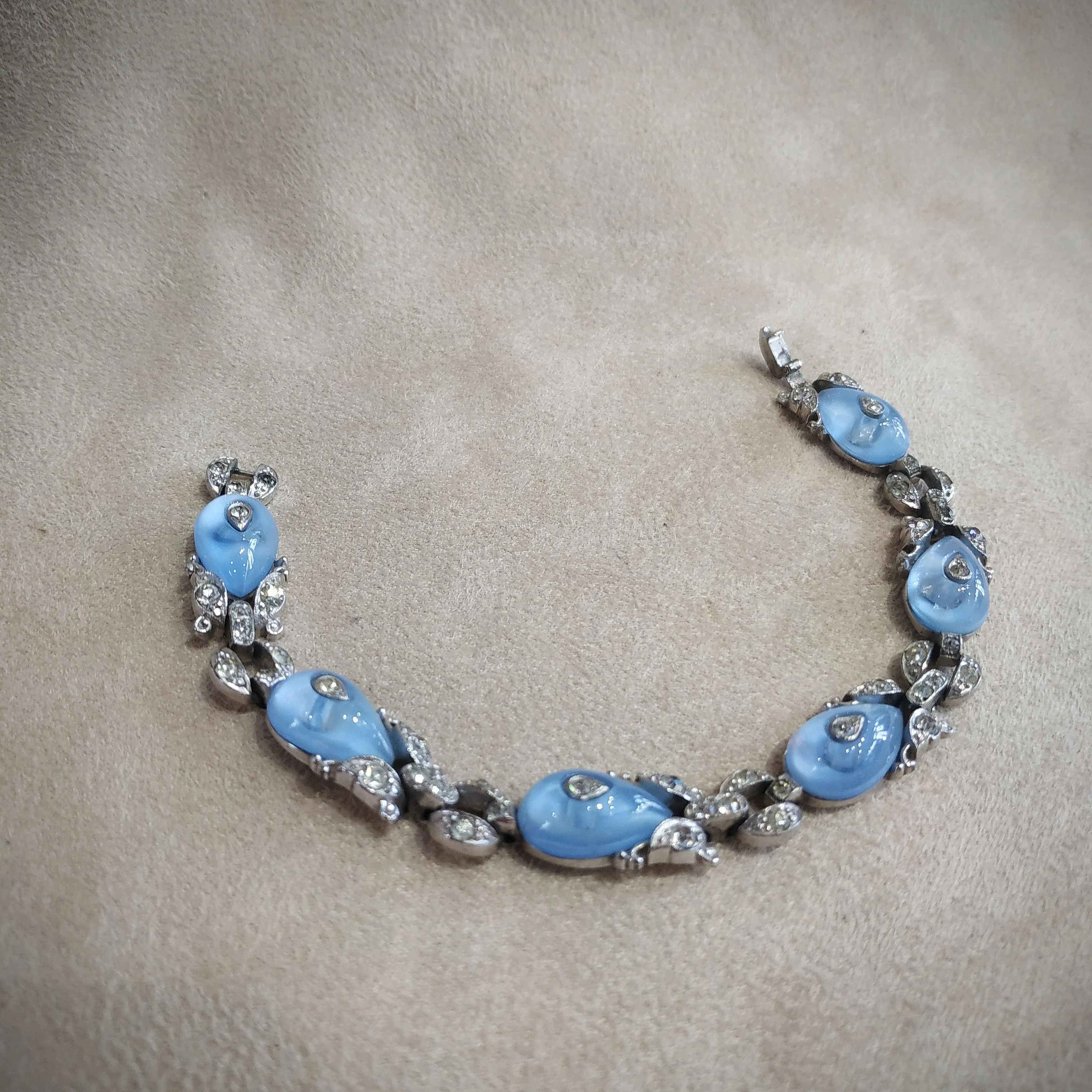 Icy blue moonglow shoe button vintage Trifari bracelet by Alfred Philippe