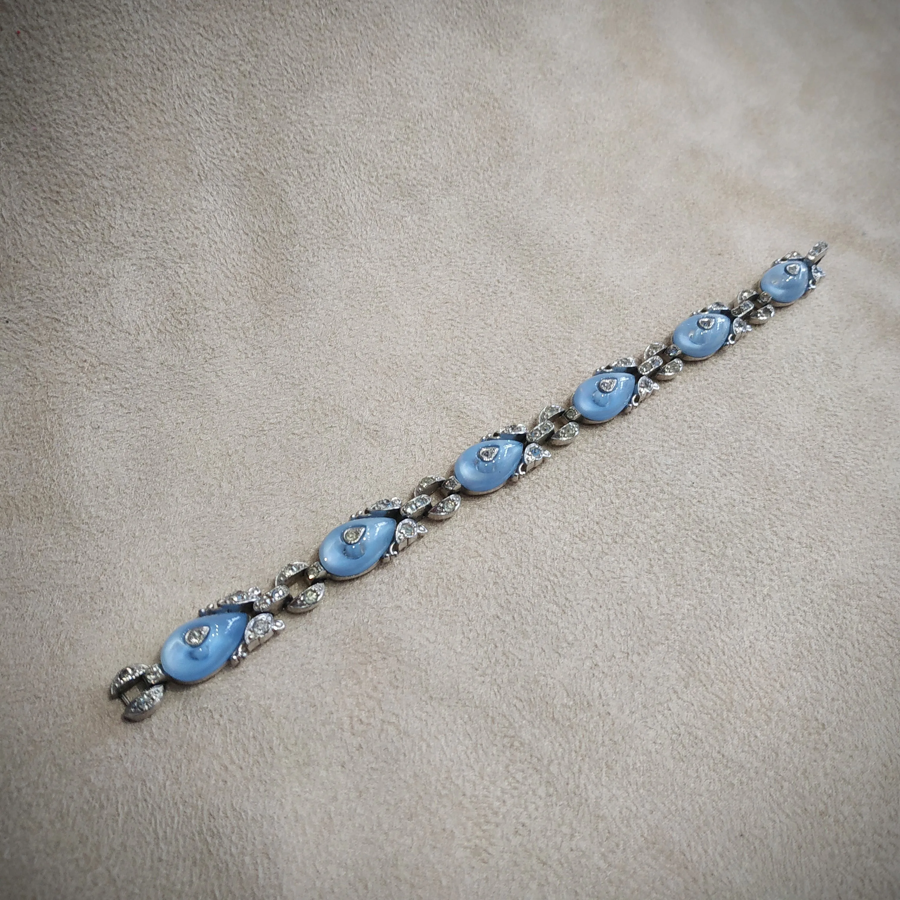 Icy blue moonglow shoe button vintage Trifari bracelet by Alfred Philippe