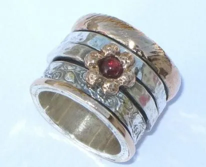 Israeli spinner rings. Floral silver gold designer jewelry Meditation ring